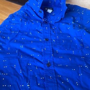 Children place shirts that blue